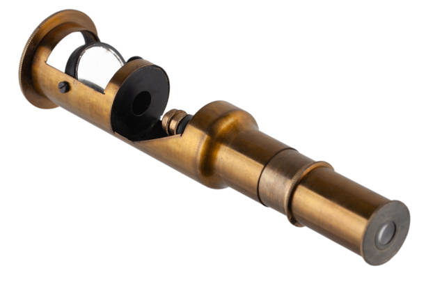 istock Vintage brass microscope. Small hand microscope from the 20th century. 1591049642