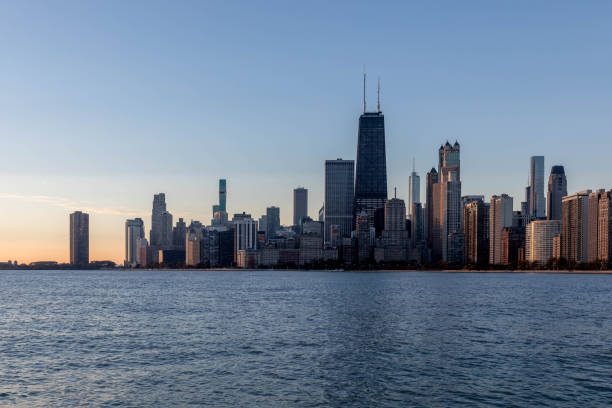 istock Chicago skyline at sunrise from North Avenue Beach 1591067988