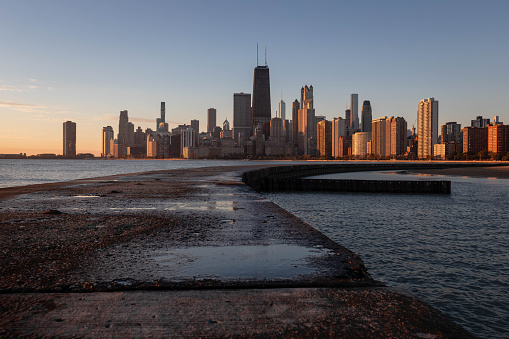 The Chicago skyline at sunrise as seen from North Avenue Beach