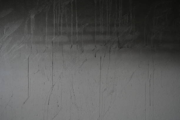 istock black dirty wall was burn from fire, construction industry 1591080116