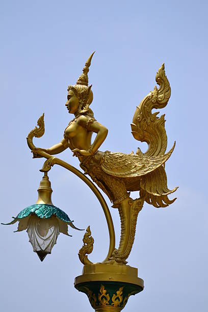 istock Golden kinnaree statue 159113818