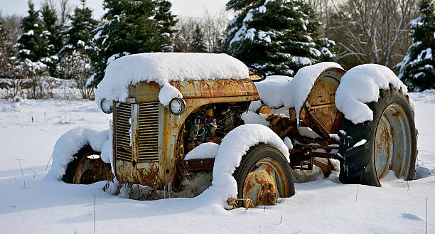 istock Farm Tractor in snow 159114805