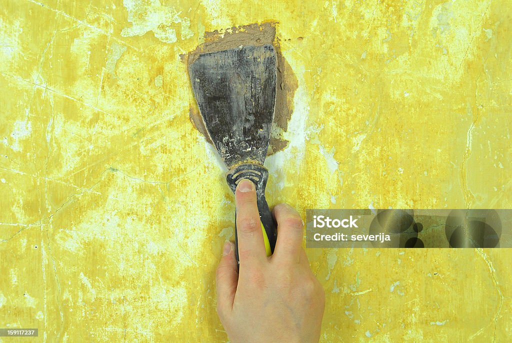 Tirita de llenado de reparación de pared - Foto de stock de Actividad libre de derechos