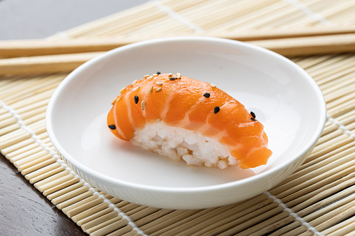 Sashimi Nigiri Sushi on a white dish at a Japanese restaurant
