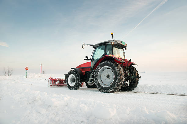 istock Large tractor clearing snow outside 159122050