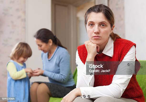 Photo libre de droit de Triste Avec Grandmère De Mère banque d'images et plus d'images libres de droit de Gronder - Gronder, Adulte, Bébé