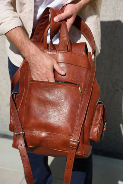 istock Leather Maroon backpack. backpack for travelers and students 1591220845