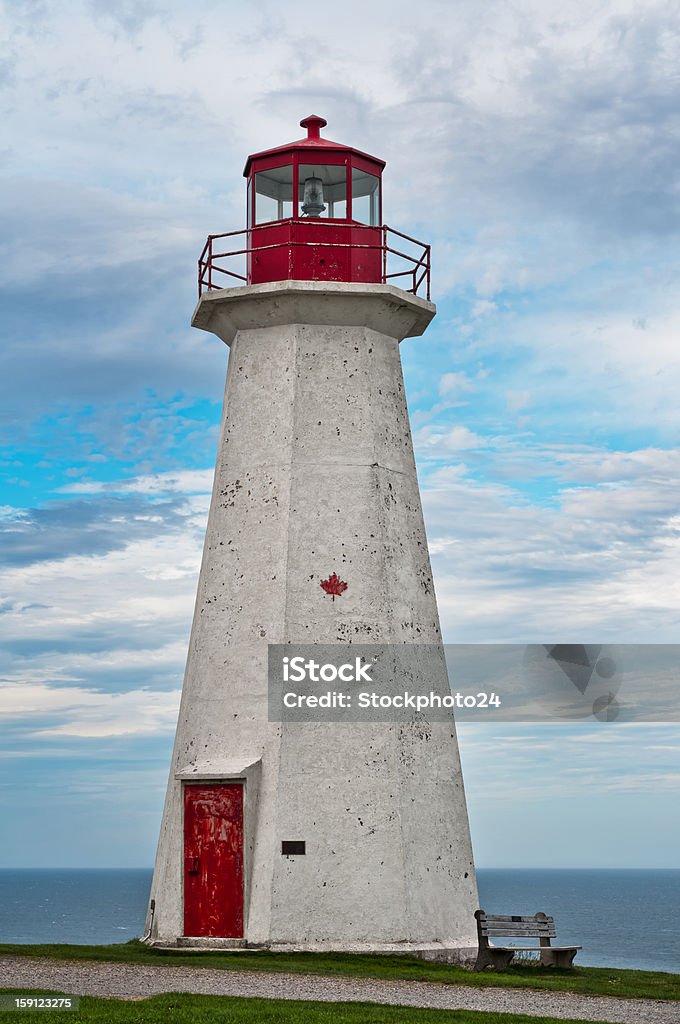 Cape george Lighthouse Cape george Lighthouse, on a cloudy day, Nova Scotia, Canada Blue Stock Photo