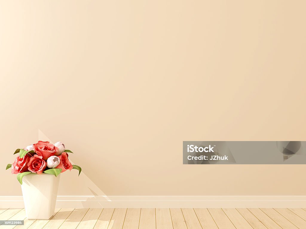 Beautiful flowers on a background A vase of flowers against the background of beige walls Backgrounds Stock Photo