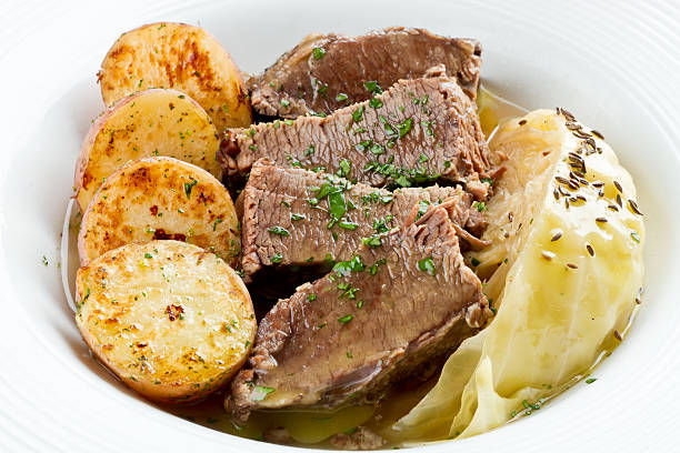 Irish Cuisine, Corned Beef, Cabbage an Roasted Potatoes Irish Cuisine, Corned Beef, Cabbage and roasted potatoes boiled stock pictures, royalty-free photos & images