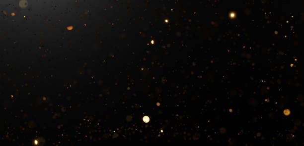 istock 3D Illustration.Gold confetti glitter on black background. (Horizontal) 1591246917