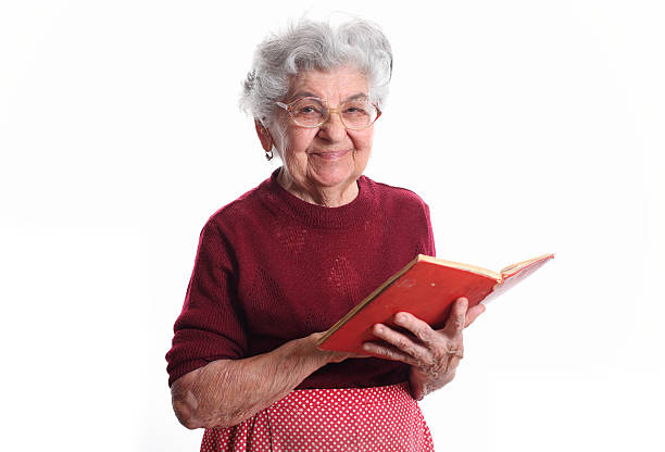 istock Granny with the book in her hands 159124937
