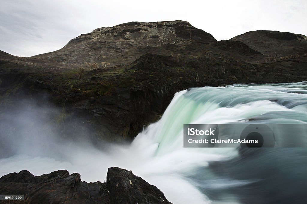 Beautiful Green Waterfall Closeup, long exposure of a large waterfall in Torres del Paine National Park, Chile.  Chile Stock Photo