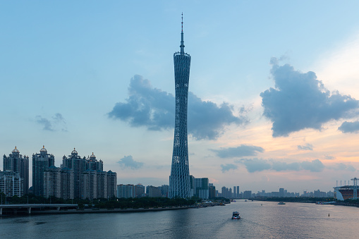 Sunset on the Pearl River with Canton Tower and Zhu Jiang Di Jing as background.