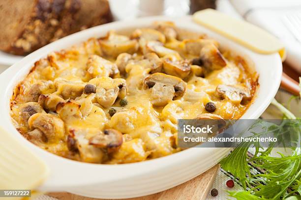 Baked Mushrooms Potatoes And Cheese Closeup Stock Photo - Download Image Now - Edible Mushroom, Casserole, Prepared Potato