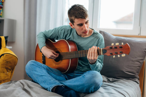 istock teenager boy at home 1591272507