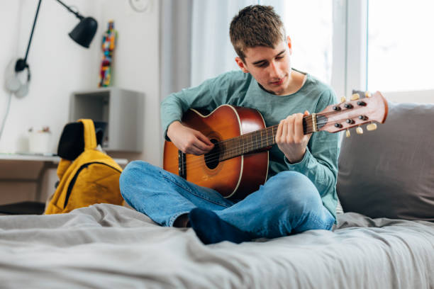 istock teenager boy at home 1591272511