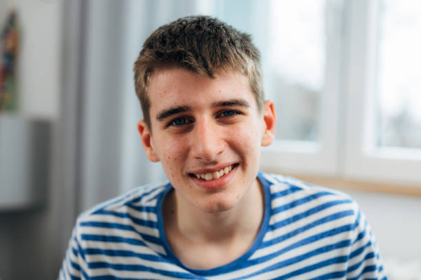 istock teenager boy at home 1591272528