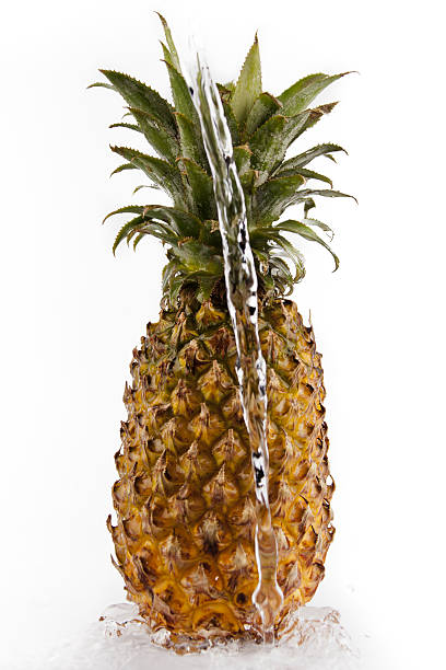 Pineapple with water splash stock photo