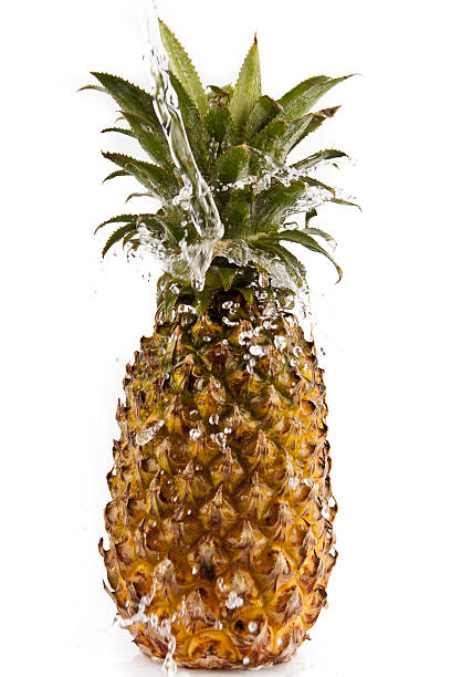 Pineapple with water splash stock photo