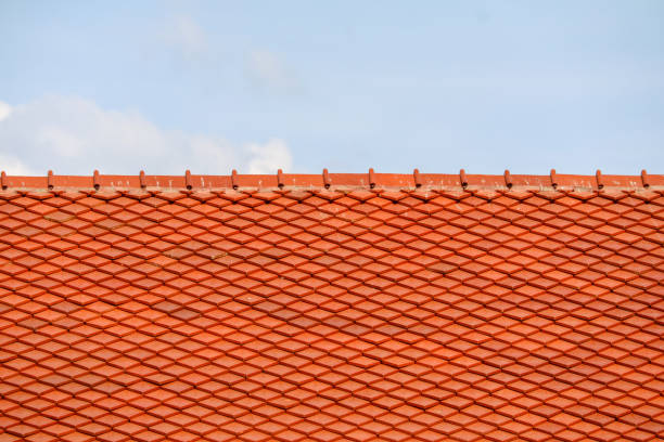 istock Roof on top and blue sky white cloud background 1591281473