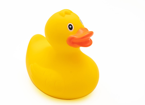 Î¥ellow rubber duck isolated on white background, above view, Baby bath fun toy.