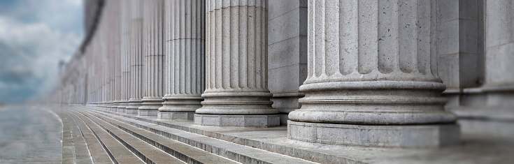 Milwaukee, Wisconsin, USA: Milwaukee County Courthouse facade in Bedford limestone - Classical Revival architecture with a Beaux-Arts influence by Albert R. Ross - Corinthian colonnade crowned by a classical entablature and a parapet wall - \