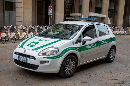 Milan , Italy  - 08 02 2023 : Polizia Locale di milano logo brand and text sign on fiat punto police local Metropolitan italian patrol vehicle