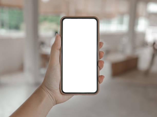 istock Women's hands holding cell telephone blank copy space screen. smart phone with technology concept 1591350127