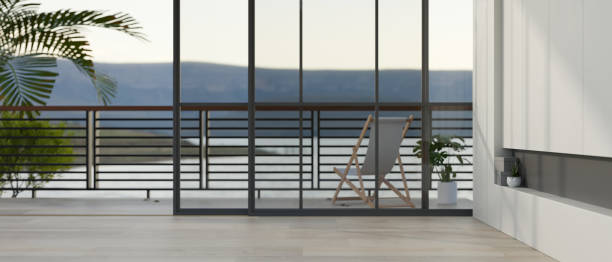 istock An empty room in modern contemporary interior style with a beach chair on a balcony 1591357192