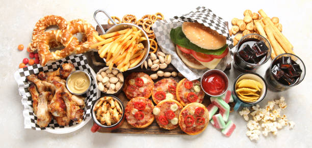 istock Fast food. American food on grey background. 1591379192