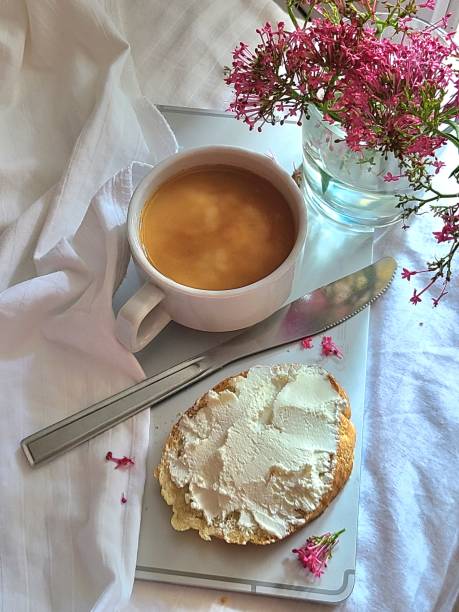 Bread, butter, coffee for breakfast stock photo