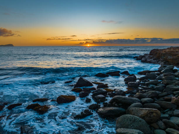 istock Sunrise over the ocean 1591425913
