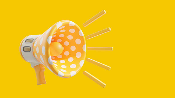 istock Megaphone white polka dot on yellow is ringing. Space on side for banner or logo. 1591430174