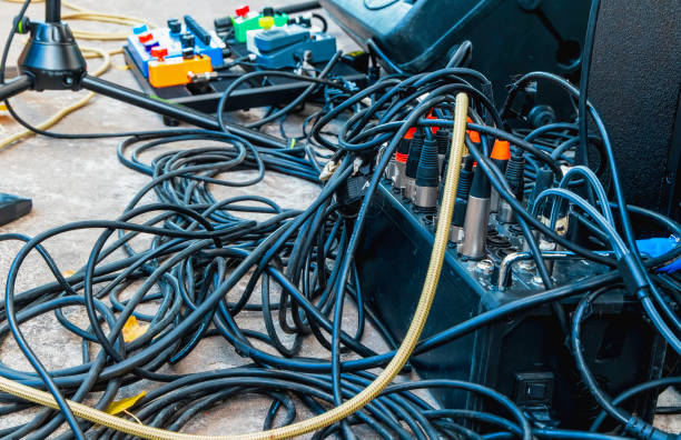 istock Stage cable mess. Technical sound preparation for a music concert 1591432748