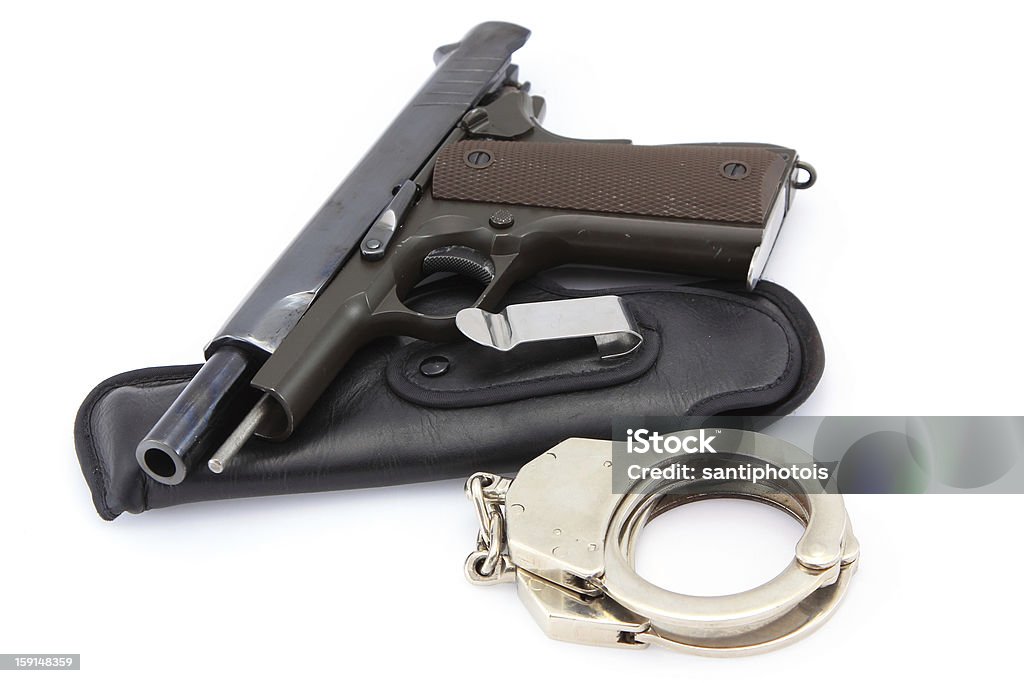 Pistole automatische und handcuff - Lizenzfrei Ausrüstung und Geräte Stock-Foto