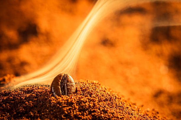 istock Closeup one coffee beans and smoke 159148583