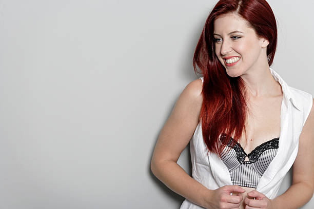istock Woman in underwear smiling 159150581