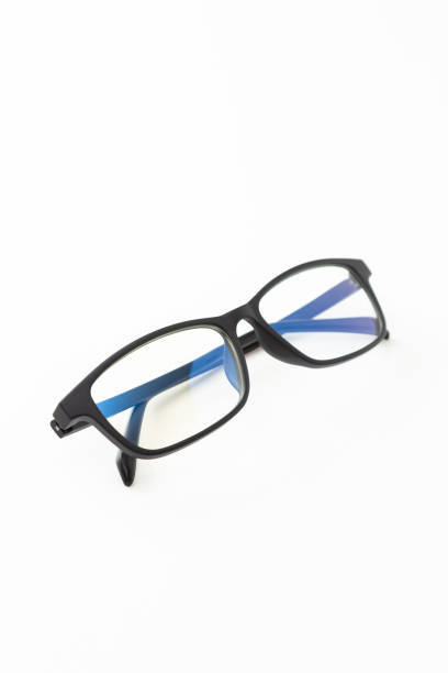 istock Black-rimmed glasses on a white background. 1591514690