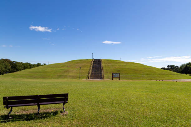 istock Tsunami evacuation mound.A hill to evacuate to during a tsunami. 1591518738