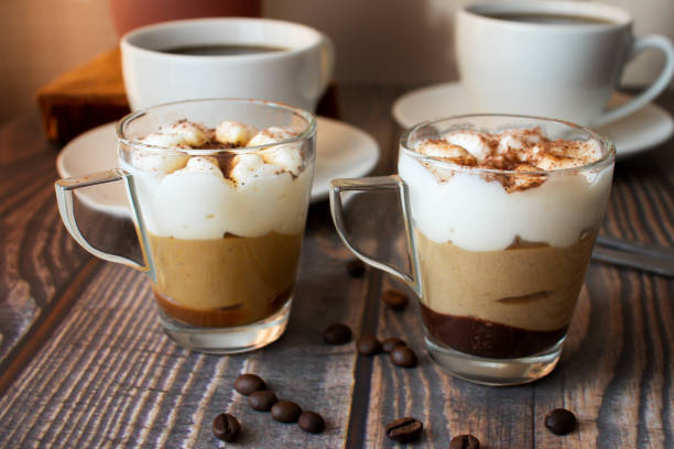 istock Coffee drink. On a wooden background. Morning. 1591518744