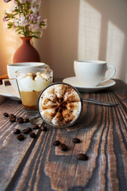 istock Coffee drink. On a wooden background. Morning. 1591519254