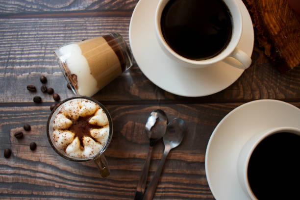 istock Coffee drink. On a wooden background. Morning. 1591519257