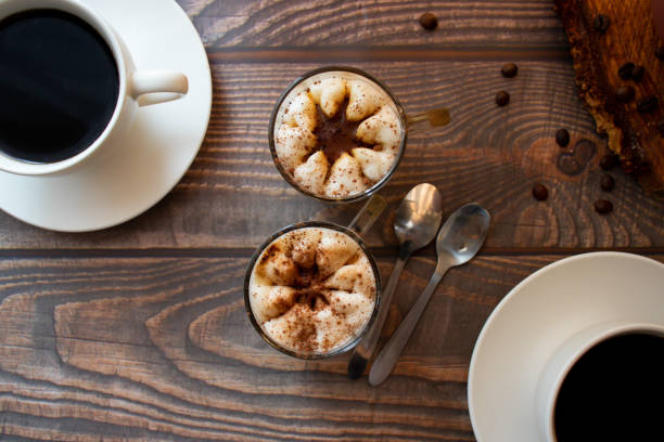 istock Coffee drink. On a wooden background. Morning. 1591519273