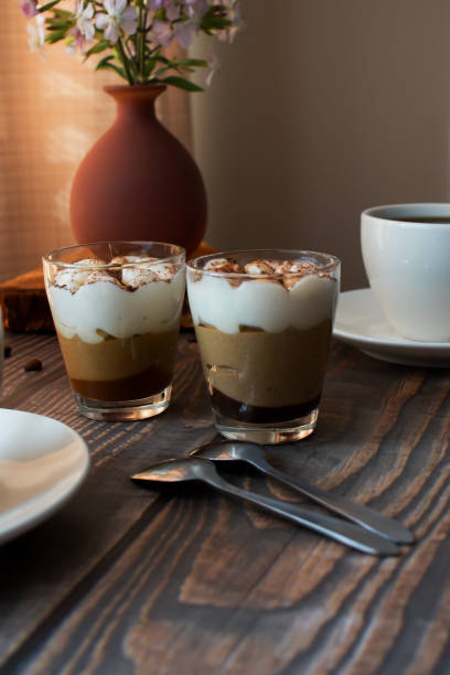 istock Coffee drink. On a wooden background. Morning. 1591519274