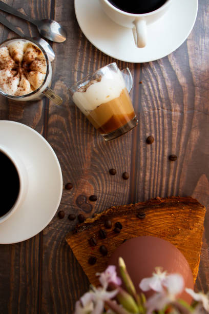 istock Coffee drink. On a wooden background. Morning. 1591519799