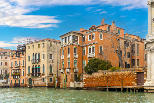 Venice cityscape, narrow water canal and traditional buildings. Italy,