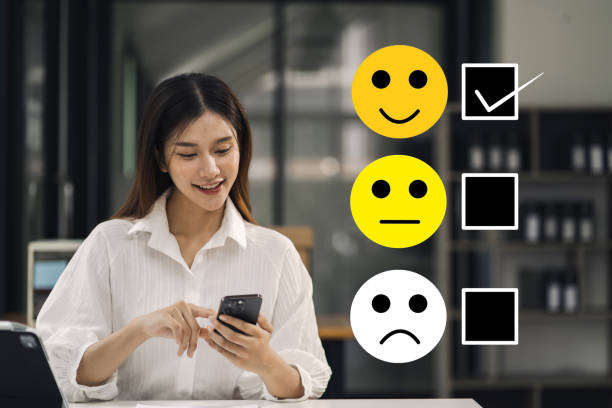 istock Happy Client customer experience concept. Woman recording phone inquiry with checkboxes, smiling face rating excellent for satisfaction survey. 1591523112