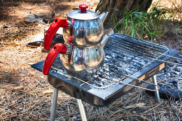 istock Turkish teapot on the barbecue. 1591559109