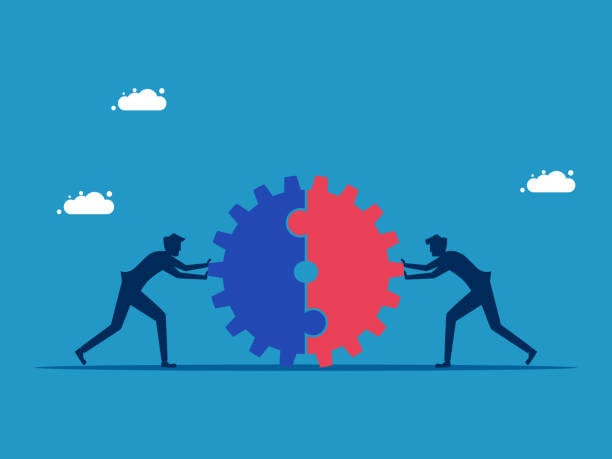 istock Business cooperation. Two businessmen pushing a cogwheel together 1591569800